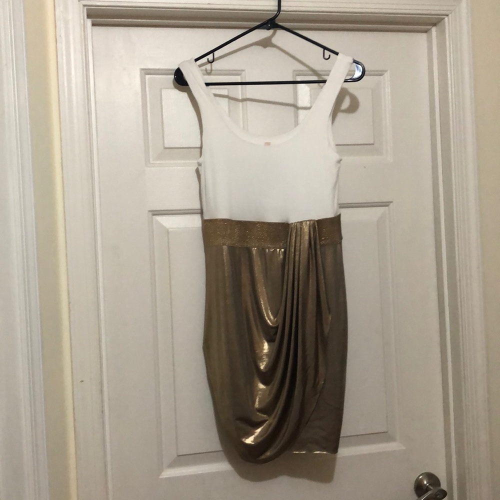 Dressed white and gold dress